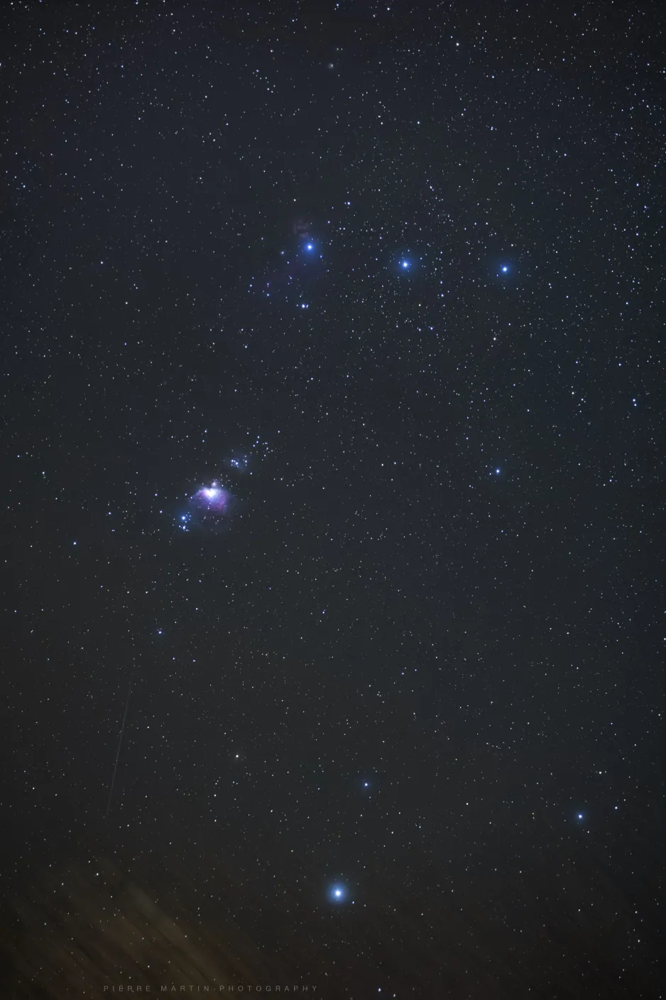 Geminid below the Great Orion Nebula.