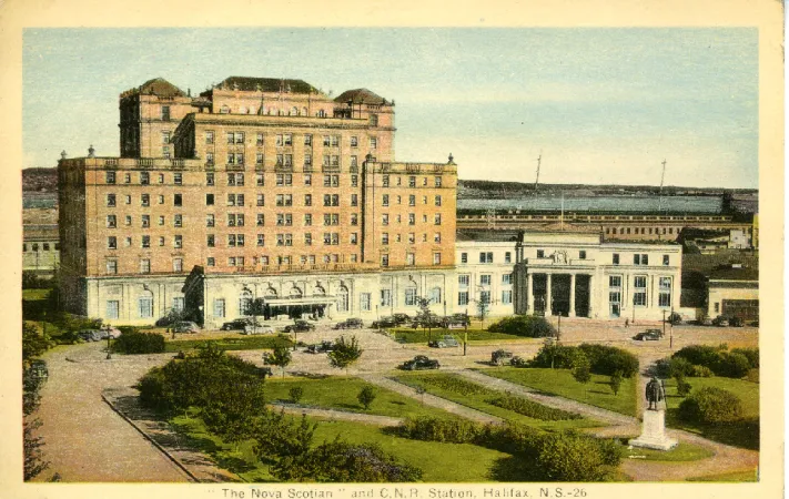 Colour post card showing 'The Nova Scotian' hotel and rail station in Halifax, Nova Scotia. 