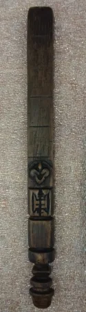  closeup of a wooden antique instrument