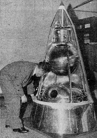 A Soviet researcher, Vladimir A. Kostrov, and a reproduction of Sputnik II displayed at the Terre et Cosmos exhibition in Paris. Anon., “Spoutniks russes à Paris.” Photo-Journal, 12 July 1958, 2.