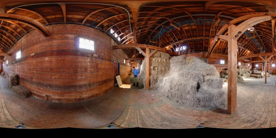 Image of the inside of the dairy barn at the Canada Agriculture and Food Museum