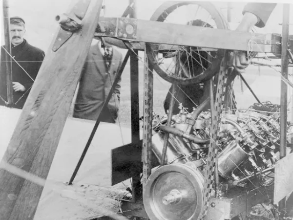 The Silver Dart's engine, now in the Museum's collection, and an earlier propeller belt drive arrangement. (CASM-23623)