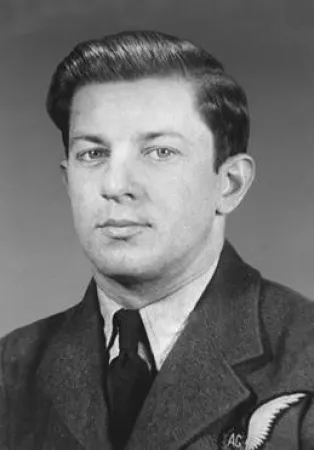 A black-and-white image of Andrew Charles Mynarski in uniform; the AG half wing badge is visible on the left side of his jacket.