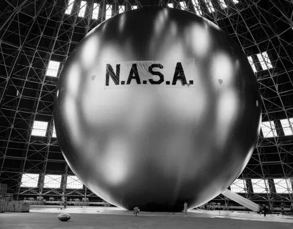 The Echo 1A satellite balloon during an inflation test, 1960. National Aeronautics and Space Administration.