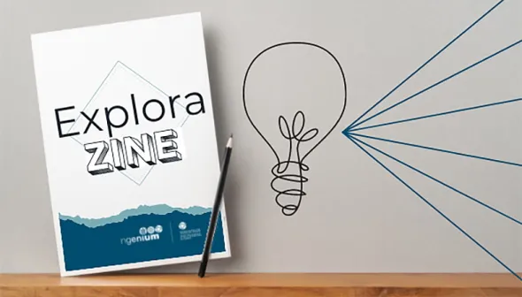 La couverture bleue et blanche d’un zine est présentée sur une tablette avec un crayon. On peut lire les mots « Explora ZINE ». Une illustration artistique d’une ampoule émettant des rayons est juste à côté. 