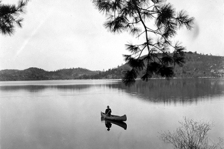 Canoe on lake in Algonquin Park