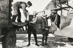 The unloading of the nitroglycerin carried from Shelby, Montana, to Calgary, Alberta, aboard the (purple?) Stinson SB-1 Detroiter operated by Great Western Airways Limited, February 1929. Anon., “–.” Canadian Aviation, April 1929, 17.