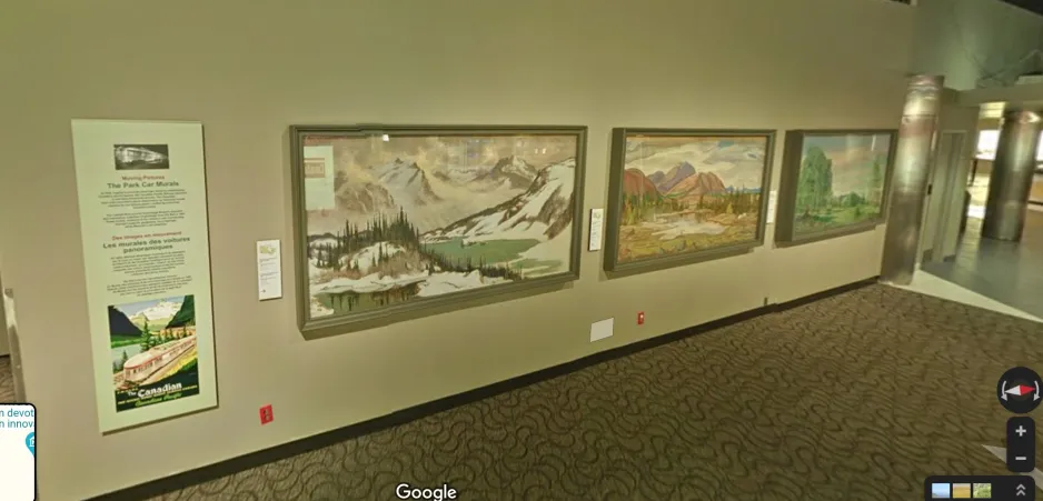 A wide shot of three large paintings, hanging on a wall inside the Canada Science and Technology Museum.
