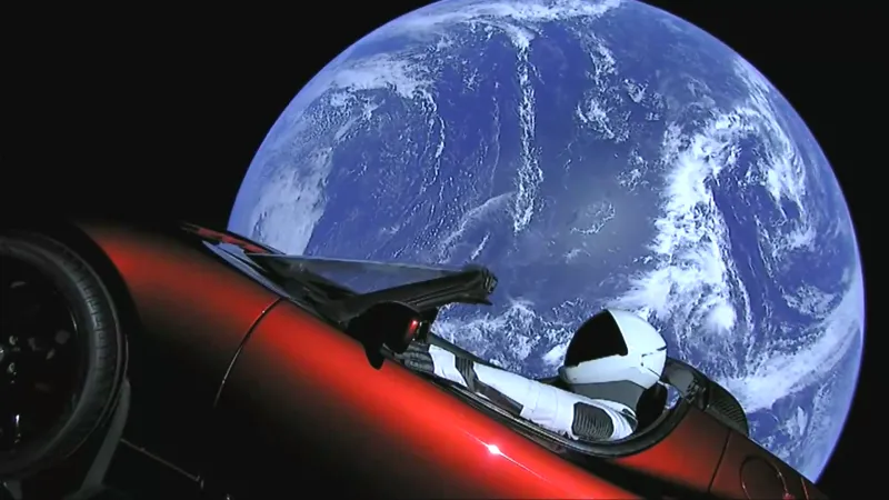 The Tesla Roadster floating through space. Earth in the background.