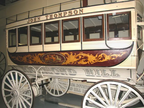 A nineteenth-century coach decorated with gold leaf and the Royal Coat of Arms 