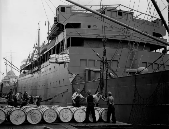 Loading supplies on the SS Lady Hawkins, docked at Halifax Harbour