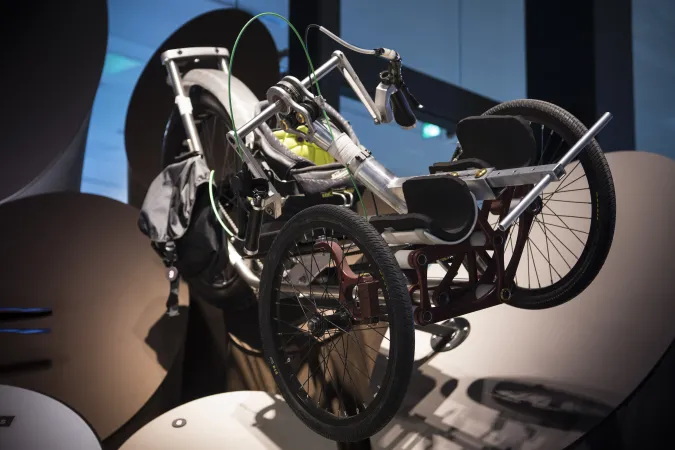 Front view if the Icon Explore prototype on display at the Canada Science and Technology Museum. The image shows the articulating frame that allows the rider to stay upright in rough backcountry environments. 