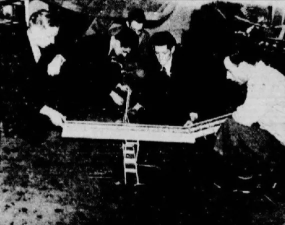 Some members of the Ligue des avions miniatures de Montréal examining the radio controlled model then under construction. Christian Verdon, “Avion-miniature contrôlé par la radio.” La Patrie, 7 January 1939, 44.
