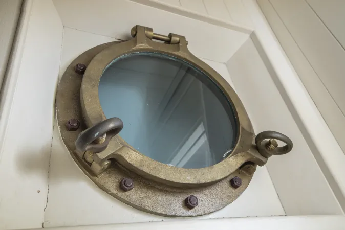 A porthole of the SS Prince Edward Island.