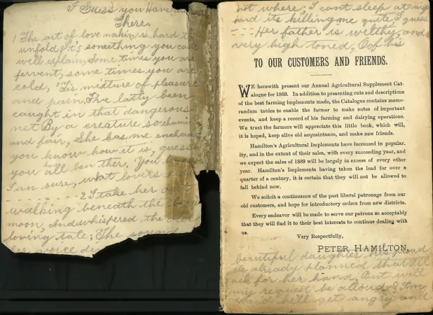 The inside front cover of the catalogue, damaged and covered with handwriting, and the first page with printed text and handwriting filling in all empty space.