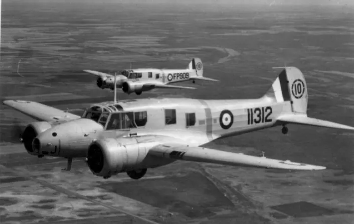 A pair of Canadian-made Avro Anson advanced training aircraft operated by No. 10 Service Flying Training School, Royal Canadian Air Force Station Dauphin, near Dauphin, Manitoba, 1943-44. CASM, 27297.