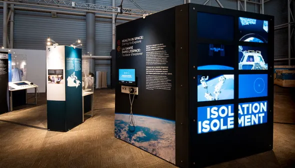 Image of text and video panels from the Health in Space: Daring to Explore travelling exhibition.